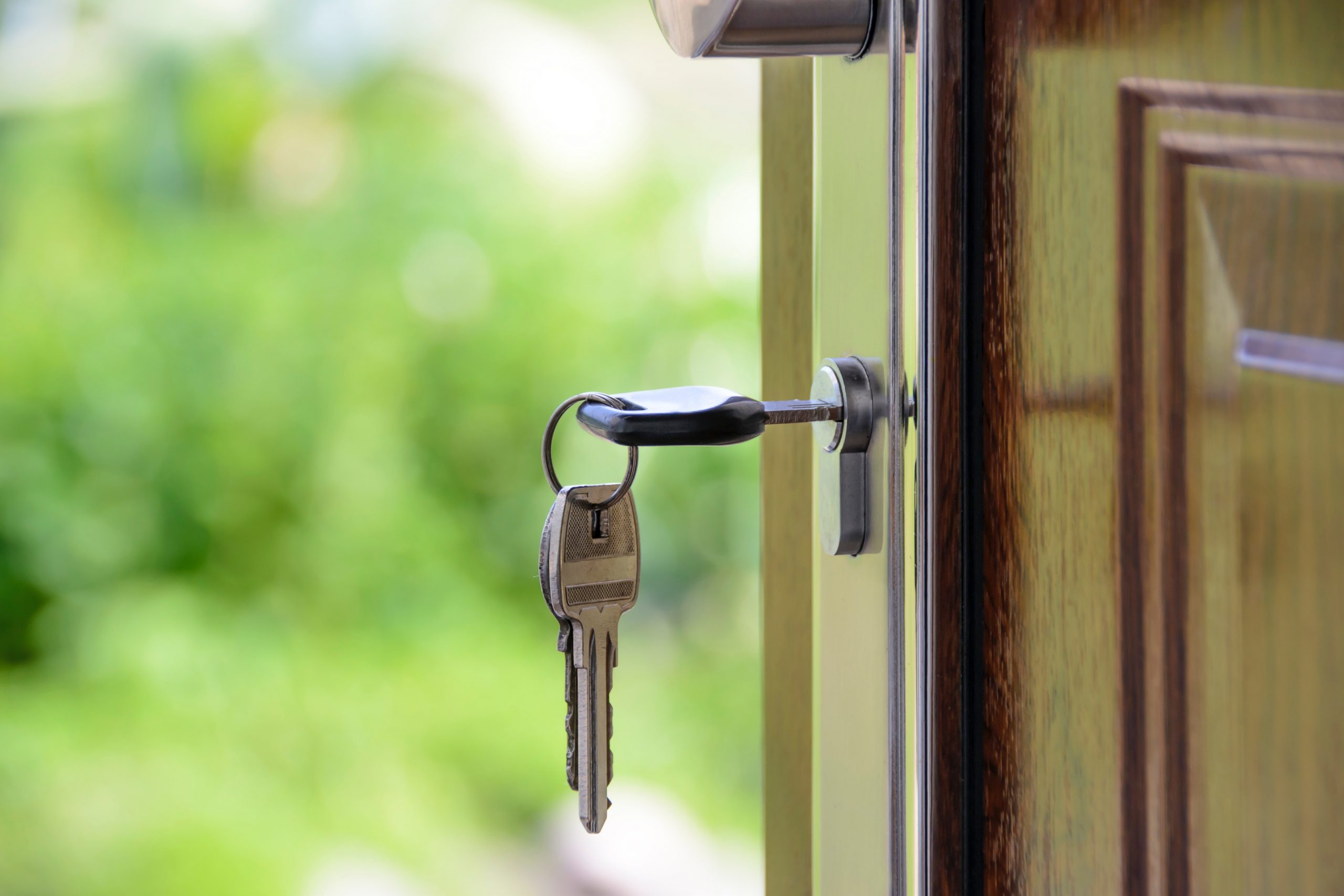 Key in front door - Tips for First-Time Home Buyers
